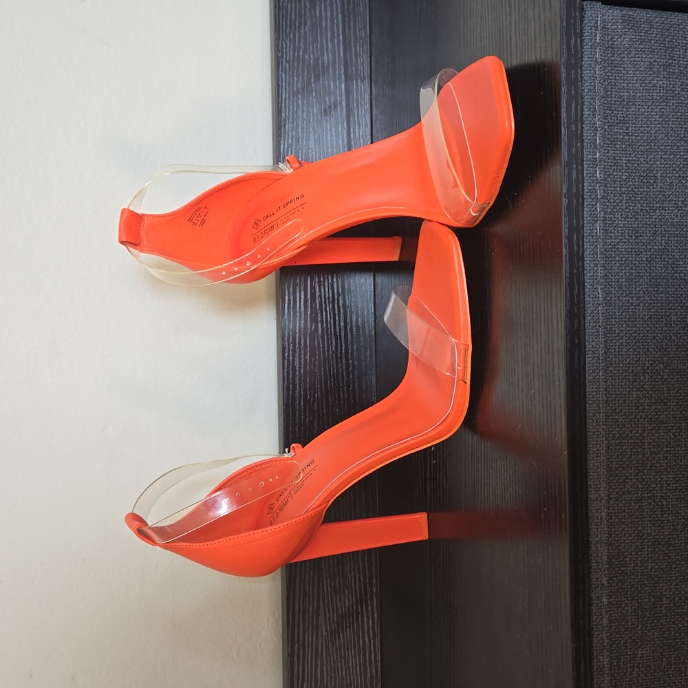 Orange high heels.